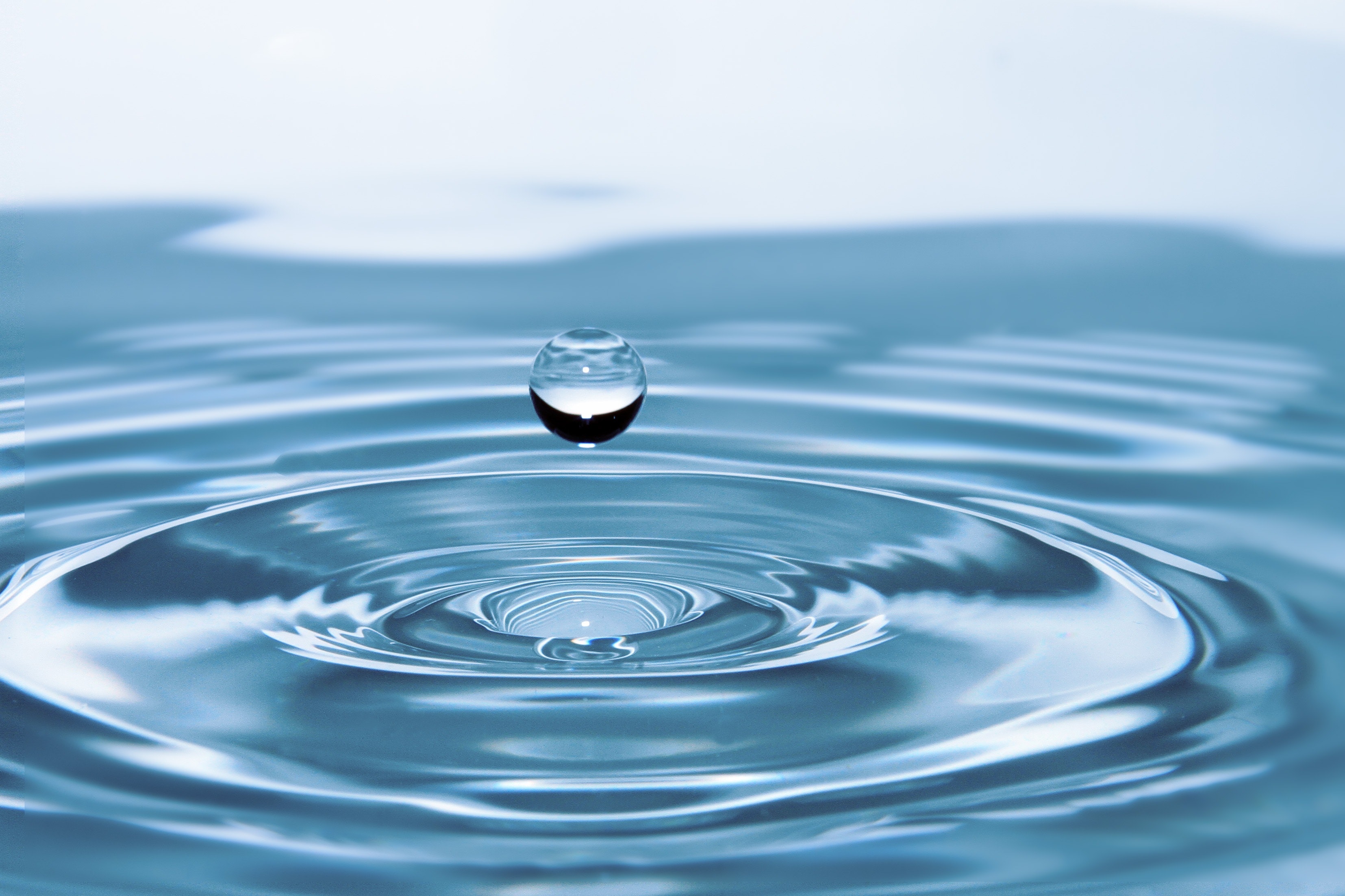 drop of water fallin into pool