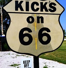 Kicks on 66 signpost